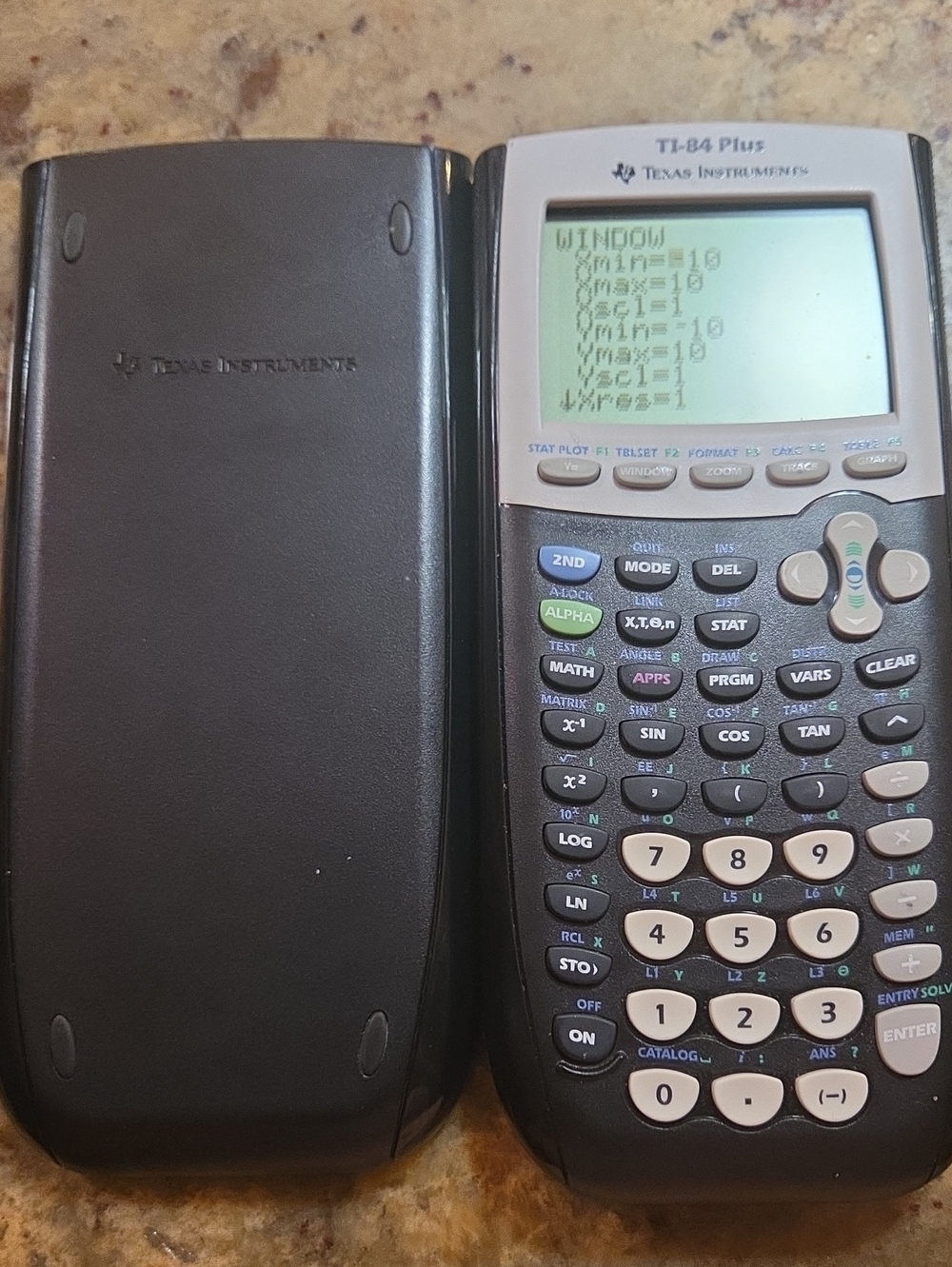 Texas Instruments TI-84 Plus Graphing Calculator in Black and White